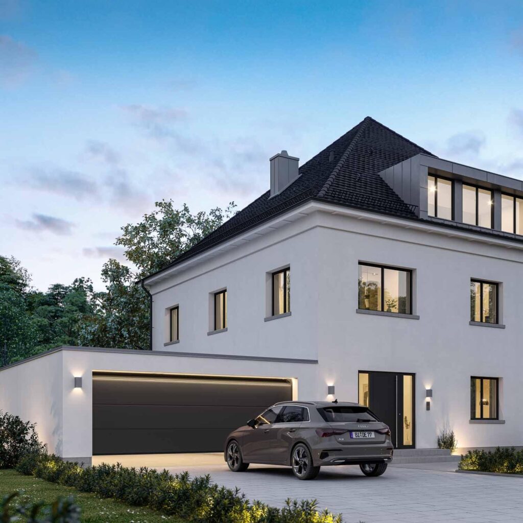 En nymonterad och välisolerad takskjutport på ett modernt villagarage.